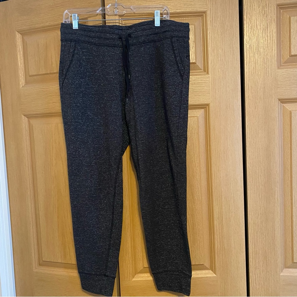 Heatherd black and white champion sweats. L